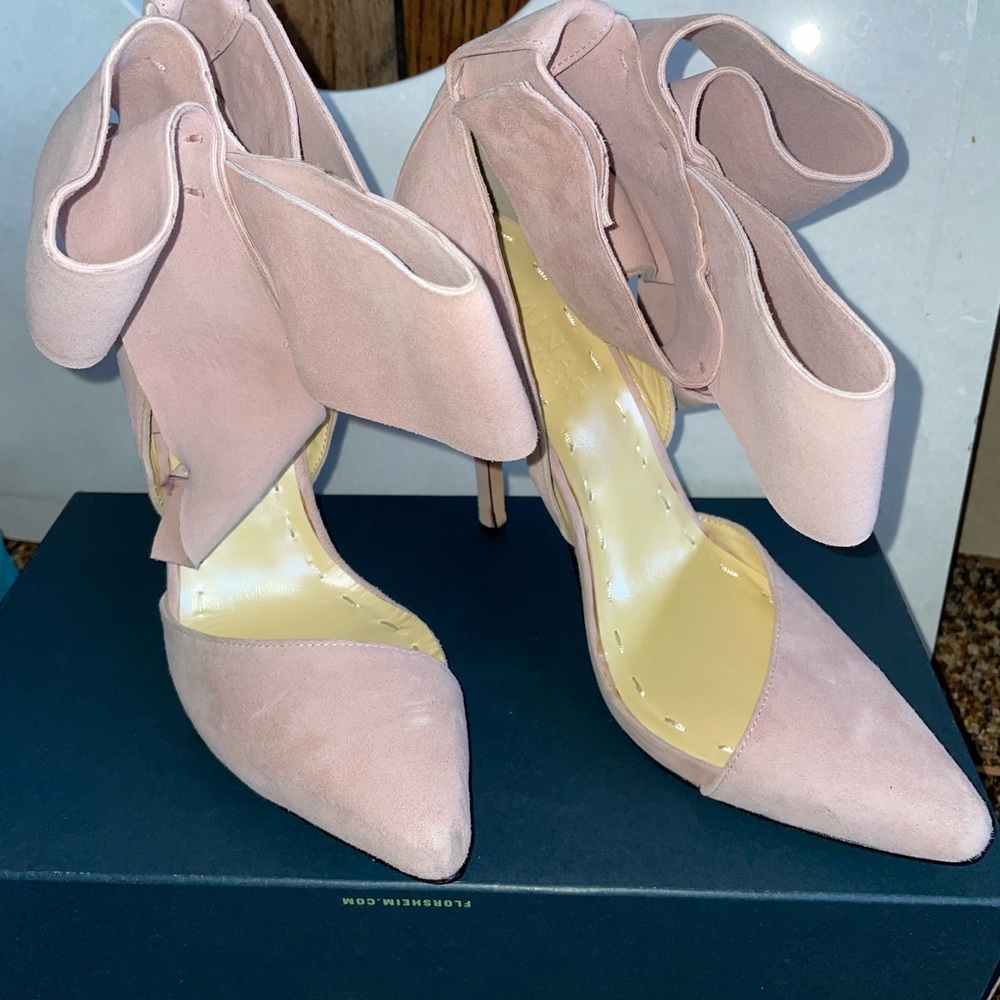 Aminah Abdul Jillil heels